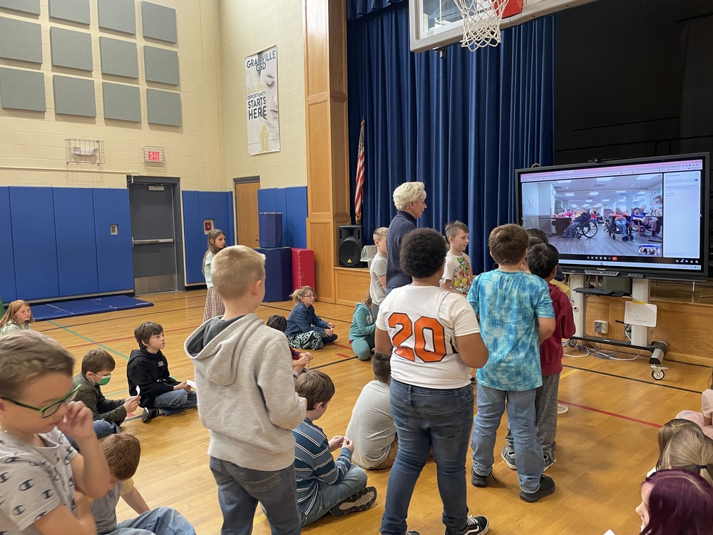 Students talking to Slate Valley